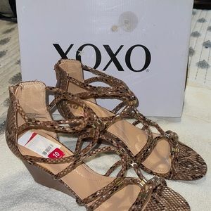 Beautiful summer sandals . NWOT. Never been used.  Spring cleanings